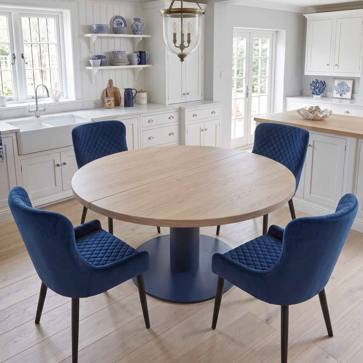 Pedestal Expandable Round Oak Dining Table