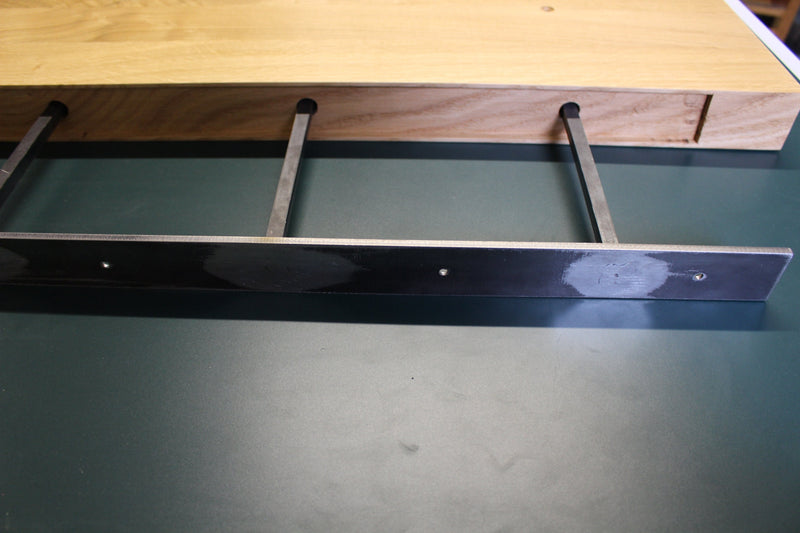 Heavy-duty steel bracket for solid oak floating shelf, hidden wall-mounting support system