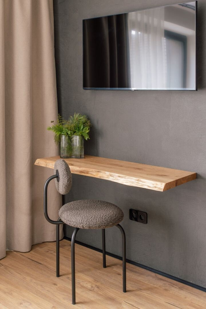 Natural oak floating wall shelf with sleek straight edge, minimalist wall-mounted storage unit