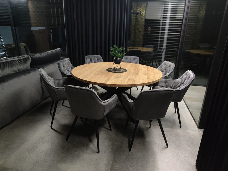 Scandinavian-style solid oak round dining table with black steel legs, expandable wood table for dining room