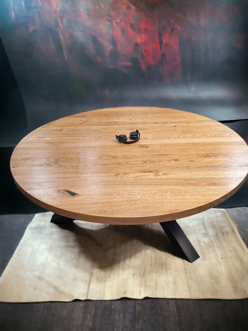 Handcrafted circular solid oak table with black spider legs – modern wooden table for kitchen or restaurant