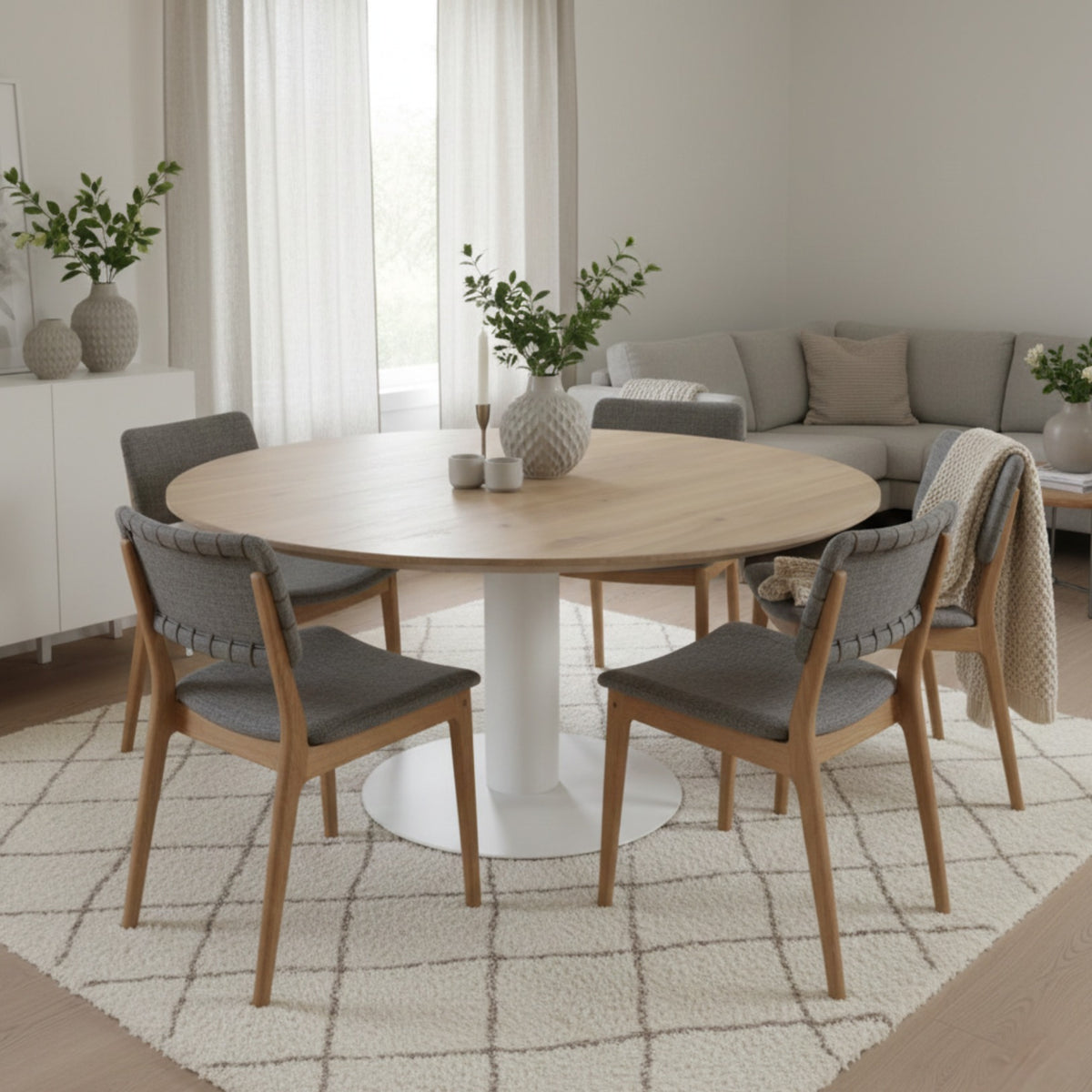 Tavolo da pranzo rotondo in quercia allungabile con gambe in metallo