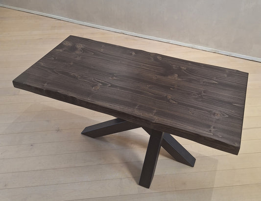 Handcrafted wooden coffee table with rectangular top and sculptural spider metal base