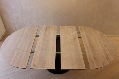 Expandable Round Oak Dining Table with Metal Pedestal Base