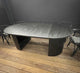 Modern patio dining table in solid oak with double pedestal legs, fully extended for 8–10 guests