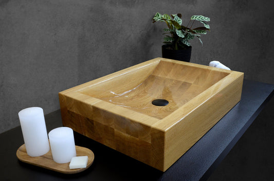 Natural wooden washbasin crafted from solid oak, featuring a smooth interior and moisture-resistant finish