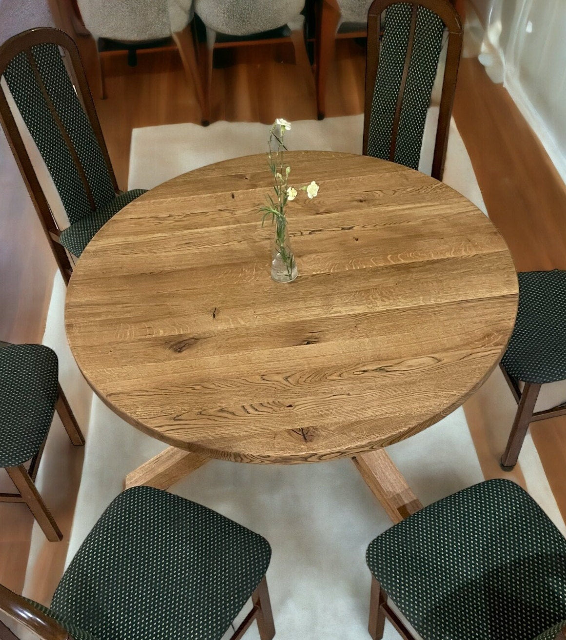Round solid oak dining table with twisted wooden spider legs – elegant handcrafted design