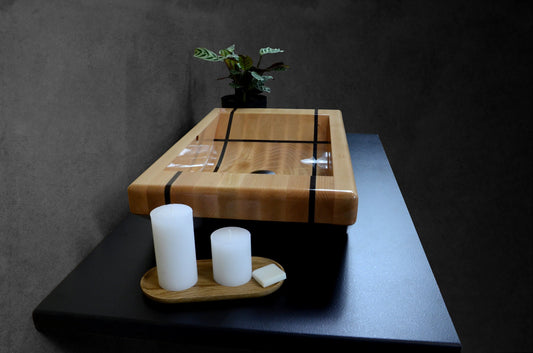 Close-up of handcrafted oak sink with detailed wenge wood striping
