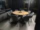 Scandinavian-style solid oak round dining table with black steel legs, expandable wood table for dining room